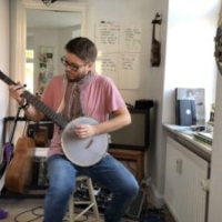 Marcus playing the banjo